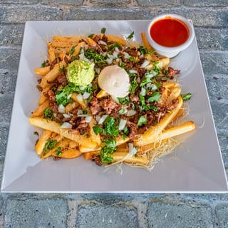 PAPAS CON CARNE ASADA