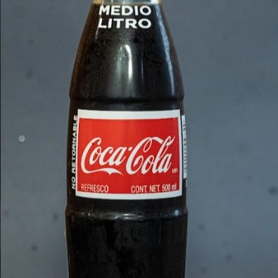 COCA-COLA CHICA BOTELLA.